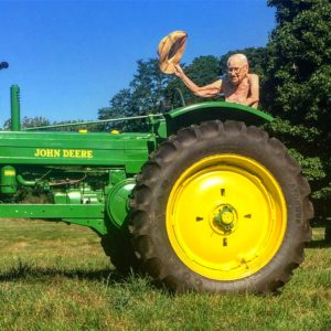 Model on John Deere Tractor